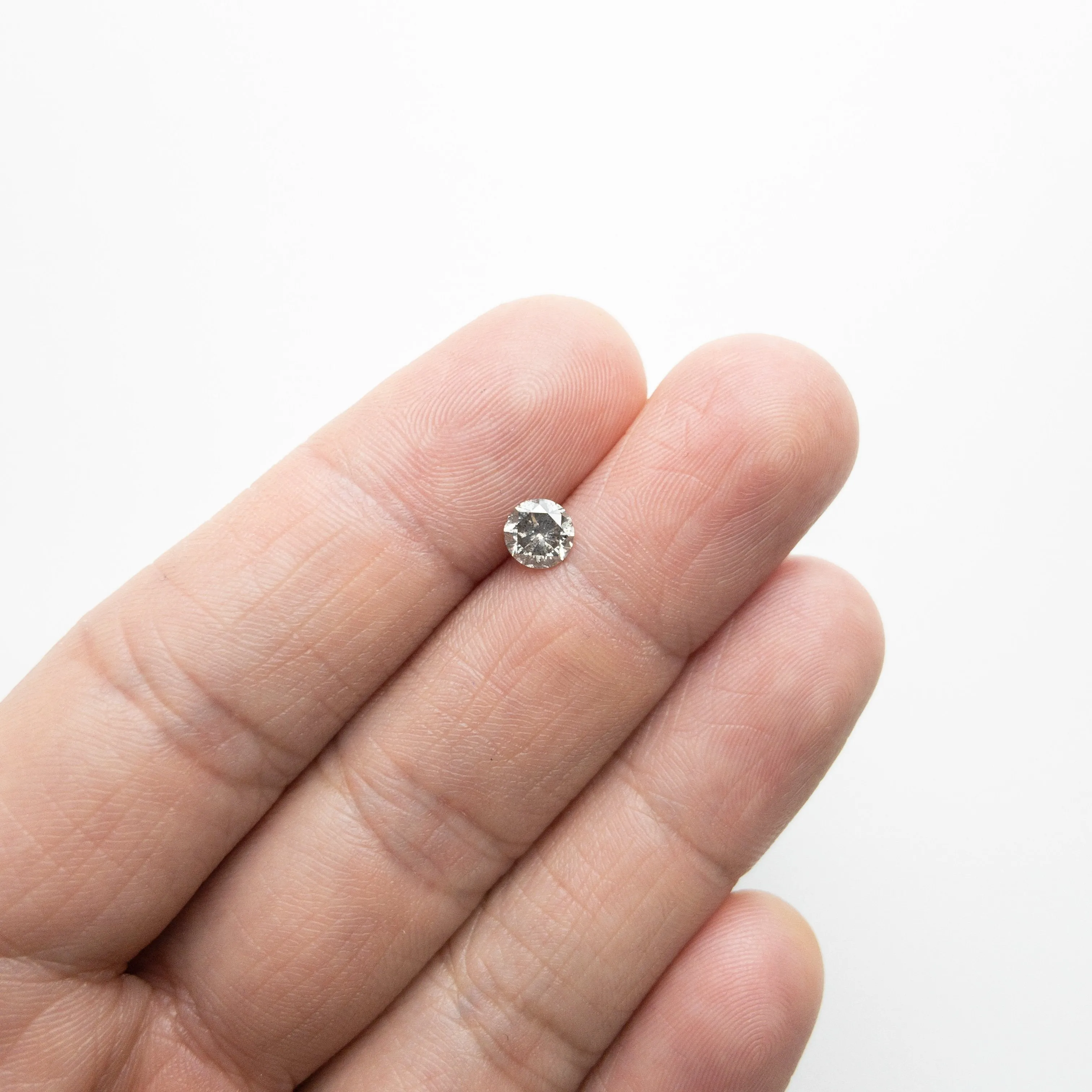 0.71ct 5.55x5.47x3.48mm Round Brilliant 18118-26